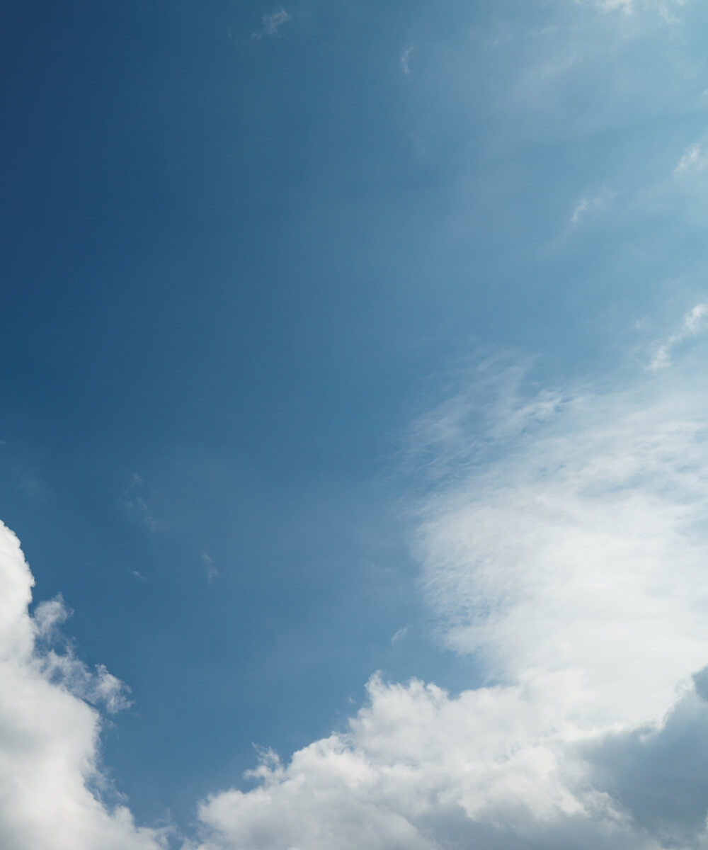 Image of White Clouds Over Blue Sky